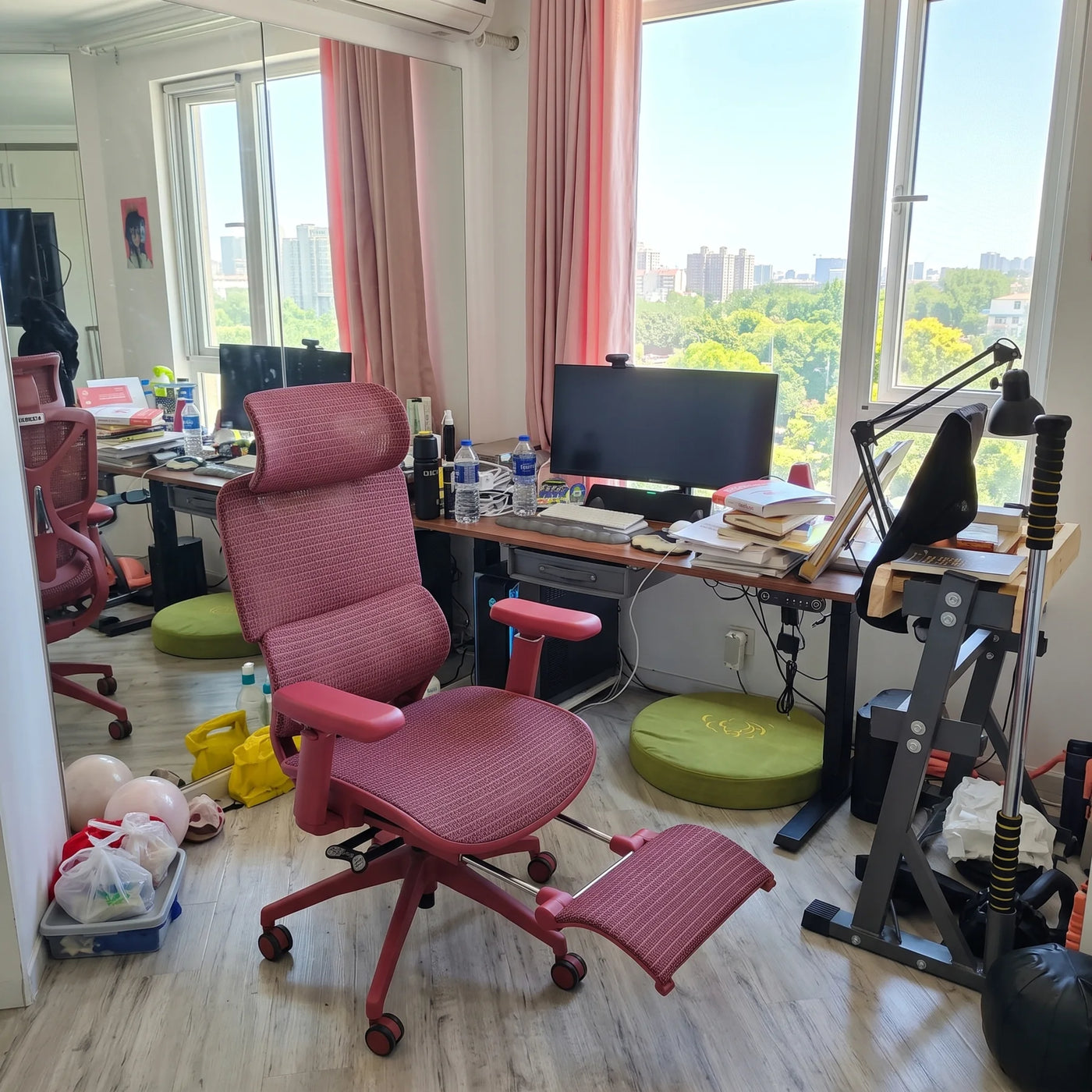 Red ergonomic chair in an illustrator home workspace